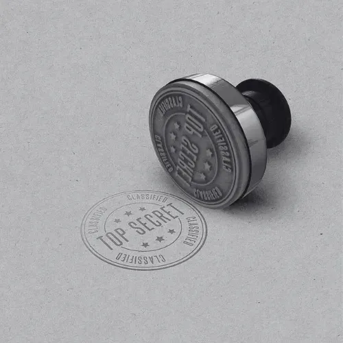 Ein „Top Secret“-Stempel und sein Abdruck auf Papier