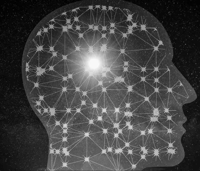 Silhouette eines Kopfes mit einem Netzwerk aus Knotenpunkten als Symbol für künstliche Intelligenz